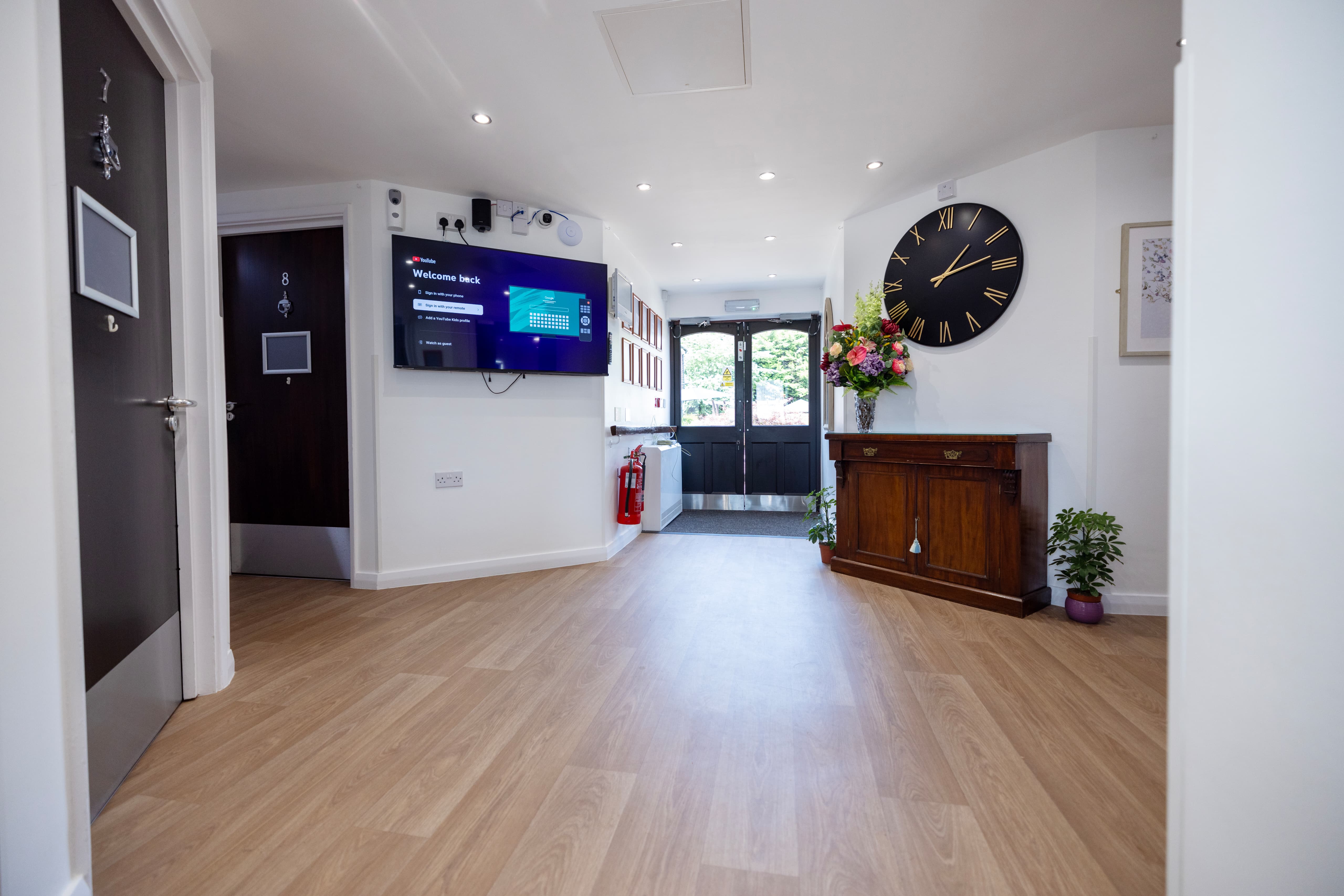 Modern entrance and reception area with digital displays